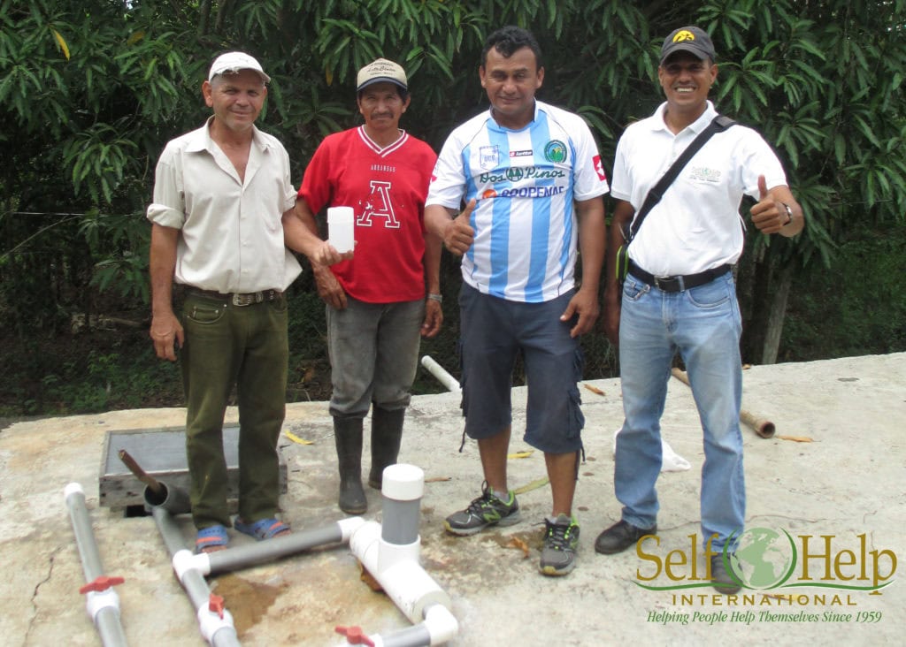 Walter Acevedo CAPS Leaders with new chlorinator