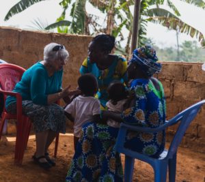 Mary Jane Oakland counsels mother in Beposo, Ghana