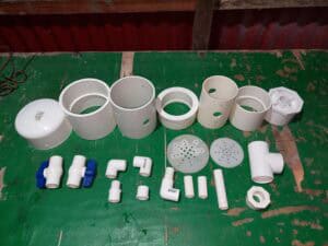 PVC pipes and fittings used with chlorinator equipment.