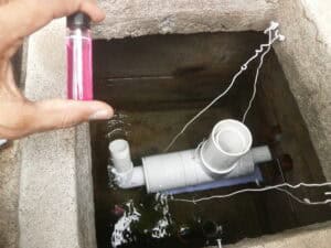 Chlorinator seen in a water tank.