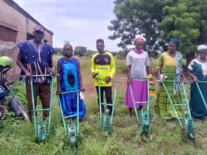 Push Planters Help Women Farmers in Ghana's Upper West Region 2 Women farmers in Ghana using push planters for planting crops.