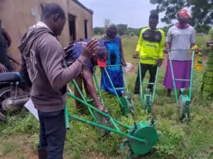 Push Planters Help Women Farmers in Ghana's Upper West Region 1 Self-Help International training farmers on their new push planters.