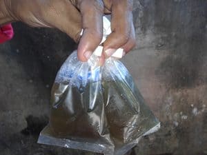 The contaminated water in Nueva Jerusalén before Self-Help International's partnership.